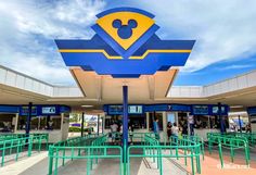 the entrance to mickey mouse's resort at disney world is blue with yellow accents