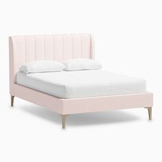 a pink bed with white sheets and pillows on it's headboard, in front of a white background