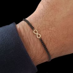 Infinity bracelet. Mens bracelet. 18k gold bracelet for men. The bracelet is made of 18k solid gold and stainless steel chain ( BLACK PVD ). Infinity has always been a romantic symbol, which is why it is also suitable as a couples bracelet. Modern design bracelet loved by men of all ages, a jewel with a strong personality but always refined and elegant. It was born from the need to create a men's bracelet in gold with a competitive price, combining sportiness and precious materials. The bracelet Gold Mens Bracelet, Infinity Bracelet Men, Boyfriend Bracelet, Bracelet Boyfriend, Gold Bracelet Simple, Bracelets For Boyfriend, Mens Chain Bracelet, 18k Gold Bracelet, Couples Bracelet