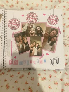 an open notebook with pictures of people on it