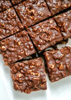 chocolate peanut butter crunch bars stacked on top of each other with the words easy chocolate peanut butter crunch bars