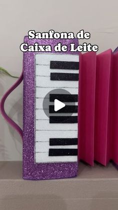 an open book with a piano on it and the words sanfona de caja de lette