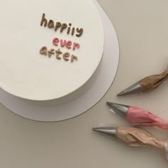 a cake that has been made to look like it's written happily ever after