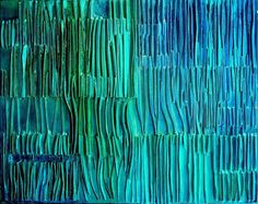 an abstract blue and green background with wavy lines on the bottom right hand side, as seen from above