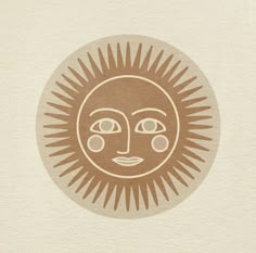 the sun with two eyes is shown in brown and beige colors on a white background