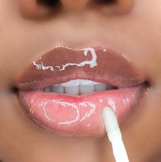 Named after its crystal clear sheen, our Flawless gloss will coat your lips in a layer of luxurious, never-sticky moisture and shine. Perfect to layer over your favorite color for extra luster or to accentuate and volumize a bare pout. Features: Light vanilla scent Shea butter Vitamin E Never contains: Parabens Phthalates GMOs Gluten Animal products Baddie Entrepreneur, Glossy Lips Makeup, Lips Gloss, Vegan Lip Gloss, Lip Gloss Cosmetics, Glitter Lip Gloss, Makeup For Black Skin, Lip Gloss Collection, Brown Skin Makeup