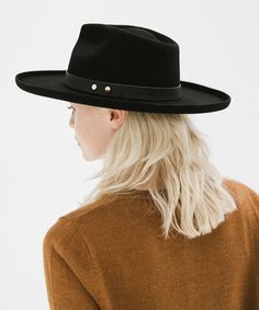 With a soft oiled leather band + pinched teardrop crown, the Luca is our new go-to fedora. Its classic shape mixed with a structured pencil roll brim makes Luca an easy choice for new hat lovers to the most avid hat girl. Classic Leather Felt Hat With Curved Brim, Elegant Leather Felt Hat With Flat Brim, Black Leather Hat With Flat Brim, Black Leather Felt Hat With Curved Brim, Black Western Felt Hat With Curved Brim, Pencil Roll, Halo Style, Find Color, Wearing A Hat