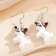 Add A Touch Of Playfulness To Your Outfit With These Brown & White Cartoon-Looking Dog Drop Earrings By Shein. These Earrings Feature A Cute Dog Design That Is Perfect For Any Occasion. The Silver Hooks Complement The White Main Stone Color And The Acrylic Material Gives Them A Light And Comfortable Feel. These Earrings Are Handmade With Care In China And Have A Length Of 1.25" (Not Including Hook). The Hook Closure Allows Them To Be Easily Worn On The Earlobe. Make A Statement With These Dangle White Cartoon, The Hook, Acrylic Material, Cute Dog, Dog Design, For Dogs, Stone Color, The White, Cute Dogs