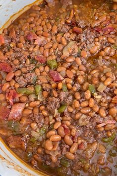 a large pot filled with lots of beans and meat