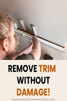 a woman working on a wall with the words remove trim without damage