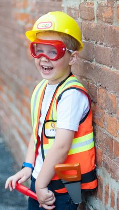 Build your heart out! This construction set has you prepped and ready for the job and looking the part in this complete 7 piece dress-up-and-play set. This set includes an orange vest with reflective stripes, a hard hat with decal, play plastic a hammer, a play plastic mini saw, a play plastic screwdriver safety goggles, and a name tag so everyone at the job site knows who you are. All our Great Pretenders Career Costumes are packaged in a reusable blue garment bag for easy storage. 7 Piece Set: Construction Worker Costume, Career Costumes, School Dress, Safety Goggles, Construction Worker, School Dresses, Diaper Bag Backpack, Garment Bag, Play Set