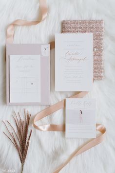 the wedding stationery is laid out and ready to be put into their guests'bags