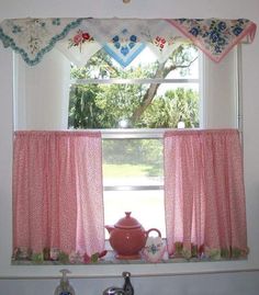 a kitchen window with pink curtains and a teapot on the counter in front of it