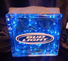 a bud light box with blue lights in it