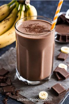 a chocolate smoothie is garnished with banana slices