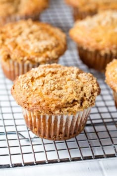 several muffins cooling on a wire rack