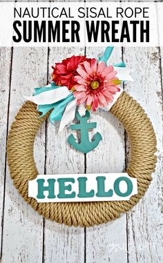 a rope wreath with an anchor and flower on it that says hello written across the front