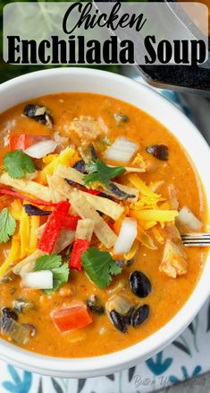 chicken enchilada soup in a white bowl with a spoon