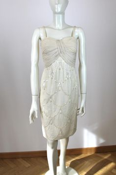 Seductive 1950s Off White Silk Dress No brand or size tags, couture item Origin: Italy Fits like: S Measurements: Bust - 87cm/34,3" Waist - 72cm/28,3" Hips - 98cm/38,6" Shown on the mannequin with the following measurements: 87-61-90cm (34,3"-24"-35,4") Condition: Very Good, there were some light stains on the armpits but we have rearranged the pleats so they are much less noticeable. Off White Silk Dress, Italy Fits, White Silk Dress, White Silk, 1950s Vintage, Dress Clothes For Women, Evening Gown, Silk Dress, Evening Dress