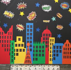 this is an image of a bulletin board with cityscape and stars on it