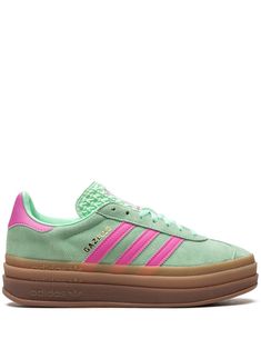 mint green/bubblegum pink calf leather signature 3-Stripes logo round toe logo-print tongue front lace-up fastening contrasting heel counter branded insole platform sole gum-rubber sole These styles are supplied by a premium sneaker marketplace. Stocking only the most sought-after footwear, they source and curate some of the most hard to find sneakers from around the world. Green And Pink Sambas, Pink And Green Adidas, Adidas Shoes Green, Sneaker Wishlist, Gazelle Outfit, Adidas Gazelle Outfit, Adidas Gazelle Bold, Gazelle Bold, Bold Shoes