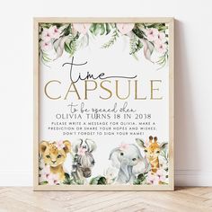 this is an image of a baby shower sign with animals and flowers on it that says time capsulele