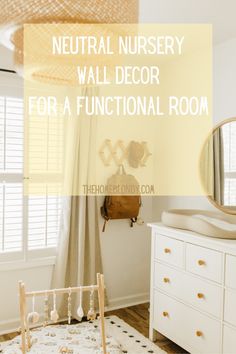 neutral nursery wall decor for a functional room