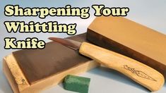 sharpening your whitting knife with green shaving block and wooden box on white background