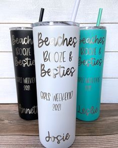 three personalized tumblers with straws on the top one is black, white and blue