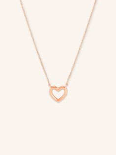 The Gold Heart Necklace features a small, open-heart design crafted from 14k gold, offering a minimalist and timeless look. Its delicate size makes it perfect for everyday wear, adding a subtle touch of elegance and charm to any outfit. This versatile necklace is a beautiful symbol of love, making it an ideal gift or personal keepsake. Small Heart Necklace, Beautiful Symbols, Symbol Of Love, Bracelet Box, Gold Heart Necklace, Open Heart, Dream Ring, Small Heart, Pendant Bracelet