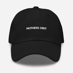 For the moms who know how to keep it cool. Our MOTHERS ONLY dad hat is the ultimate laid-back accessory for the busy mama who's too busy being a boss to care. Effortlessly stylish, with a low-key vibe that says it all, this hat is perfect for school runs, coffee runs, and just because runs. Crafted from premium chino cotton twill with an adjustable strap for the perfect fit, it's embroidered with MOTHERS ONLY--because, let's be real, no one else can handle the job. Throw it on, and you're good to go. No fuss, just flawless. * 100% chino cotton twill * Unstructured, 6-panel, low-profile * 6 embroidered eyelets * 3 ⅛" (7.6 cm) crown * Adjustable strap with antique buckle * Blank product sourced from Vietnam or Bangladesh This product is made especially for you as soon as you place an order, Mom Hat, Customizable Black Dad Hat Baseball Cap, Black Embroidered Dad Hat, Black Baseball Cap With Curved Brim For Father’s Day, Personalized Dad Hat, One Size Fits Most, Pink Dad Hat With Embroidered Logo, One Size, Low Key, Trucker Cap, Dad Hats