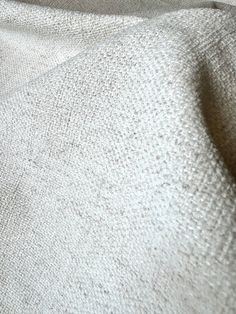 a close up view of a white fabric