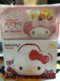 two hello kitty mcdonald's boxes with fries in the front and one on the back