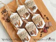 four soap bars with cinnamons and coffee beans on a cutting board