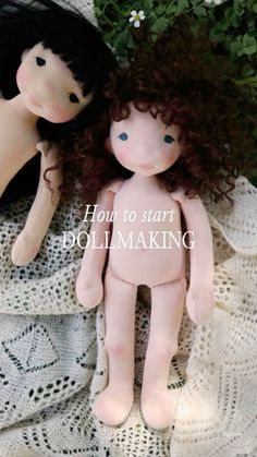 two dolls sitting on top of a white doily next to green plants and the words how to start dollmaking