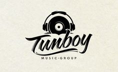 the logo for a music group called tumboy, with headphones on it