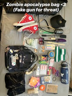 A bag of essentials for an apocalypse! Fake gun for threatening, and endless food😅 Zombie Apocalypse Bag, Apocalypse Bag, Everyday Bag Essentials, Grunge Fits, School Bag Essentials, Inside My Bag, Purse Essentials, Handbag Essentials, Backpack Decoration