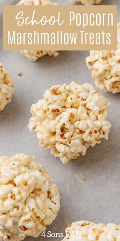 some popcorn marshmallow treats are on a baking sheet with the words school popcorn marshmallow treats