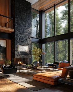 a living room filled with furniture and windows next to a fire place in the middle of a forest