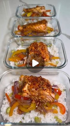 four plastic containers filled with food on top of rice