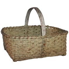 an old woven basket is shown on a white background