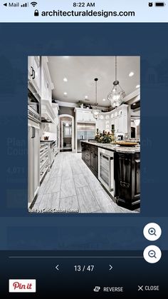 an image of a kitchen with white cabinets and wood flooring on the phone screen