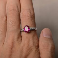 This is a gorgeous handmade creation. Its beauty is its simplicity & Elegance. The 7*9 mm oval shape faceted lab ruby is crafted in solid sterling silver and with rhodium plated. All item is sent in a beautiful gift box If you have any idea of design your ring,pls contact me directly. You can realize more lovely stuff clicking the link https://www.etsy.com/shop/knightjewelry?refshopsection_shophome_leftnav Please leave the correct address and you phone number for delivering successfully. Oval Ruby Ring With Center Stone In Sterling Silver, Oval Ruby Birthstone Ring With Accent Stones, Oval Lab-created Ruby Birthstone Ring With Center Stone, Oval Lab-created Ruby Birthstone Ring, Oval Ruby Birthstone Ring In White Gold, Oval Ruby Solitaire Ring, White Gold Oval Ruby Birthstone Ring, White Gold Ruby Ring With Accent Stones, Oval Shaped, Pink Ruby Ring In Sterling Silver