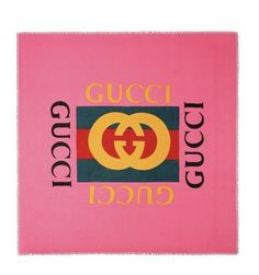 the gucci logo is shown on a pink square scarf with black and yellow lettering