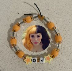 i made this orange juice inspired bracelet 🧡🍊🥤 Melanie Martinez Inspired Bracelet, Melanie Martinez Kandi, Orange Juice Melanie Martinez, Melanie Bracelet, Concert Bracelets, Melanie Martinez Concert, Fan Bracelet