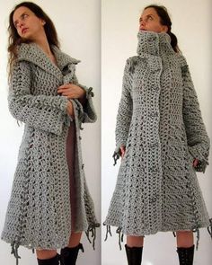 the woman is wearing a gray crocheted coat