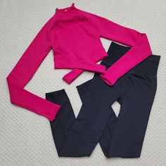 Nwot Free People Movement Good Karma Leggings & Longsleeve Paris Solid Wrap Waist Crop Top Set. Size Xs/Small. Crop Top Is A Vivid Hot Pink With A Criss-Cross Waist, Ribbed Fabric & Lettuce Edging Around The Neckline. Longsleeves Have Finger Holes. No Exterior Logo. Inner Size Label Is Worn Down. Good Karma Leggings Are Highwaisted With Vented Pinholes. No Exterior Logo. Cheap Red Crew Neck Crop Top, Pink Long Sleeve Sets For Winter, Pink Long Sleeve Winter Sets, Fitted Pink Activewear With Thumbholes, Tight Long Sleeve Winter Activewear, Pink Long Sleeve Sets For Fall, Stretch Long Sleeve Winter Set, Fitted Pink Tops With Thumbholes, Fitted Pink Top With Thumbholes