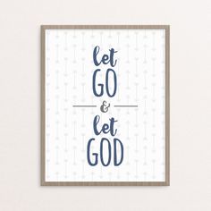 a framed poster with the words let go and let god in green on white background