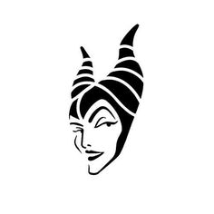 an egyptian woman's face with horns and a turban on her head