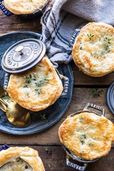 two pot pies sitting on top of a blue plate